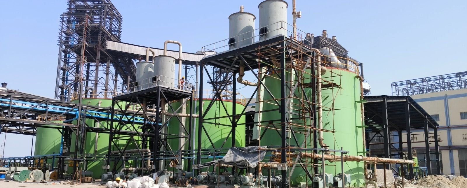 Process tanks, platforms and piping at an industrial plant